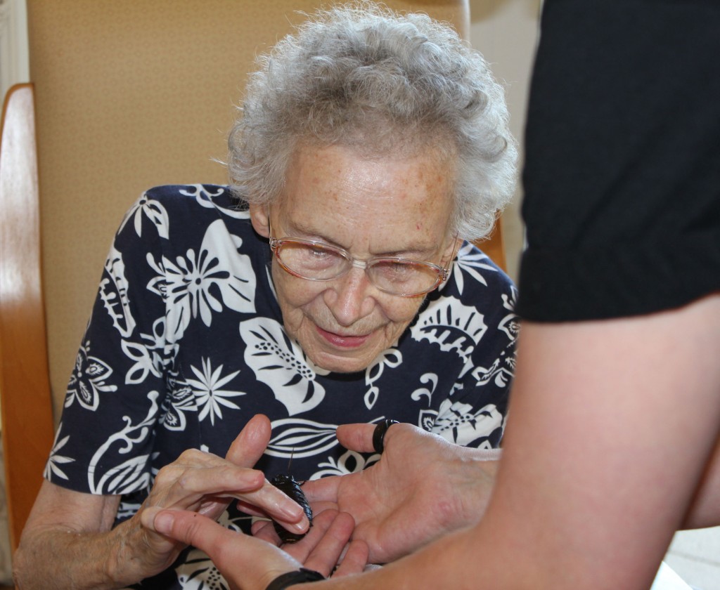 Residents enjoying the Zoolab experience at Bradfield Residential Home, Kent